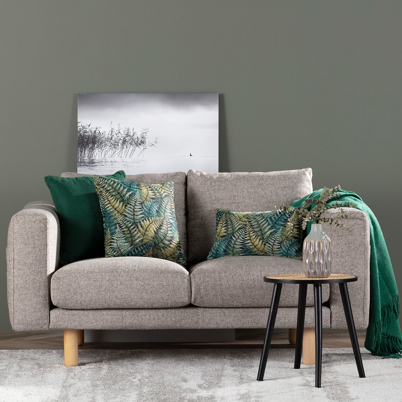 Grey sofa 2024 green cushions